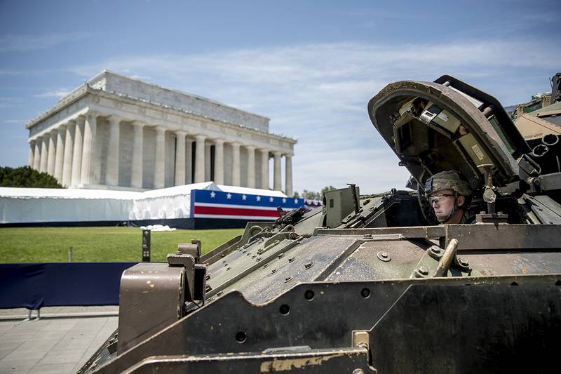 One of two Bradley Fighting Vehicles waits to be driven into place in front of the Lincoln Memorial for President Donald Trump's "Salute to America" event honoring service branches on Independence Day, Tuesday, July 2, 2019, in Washington.