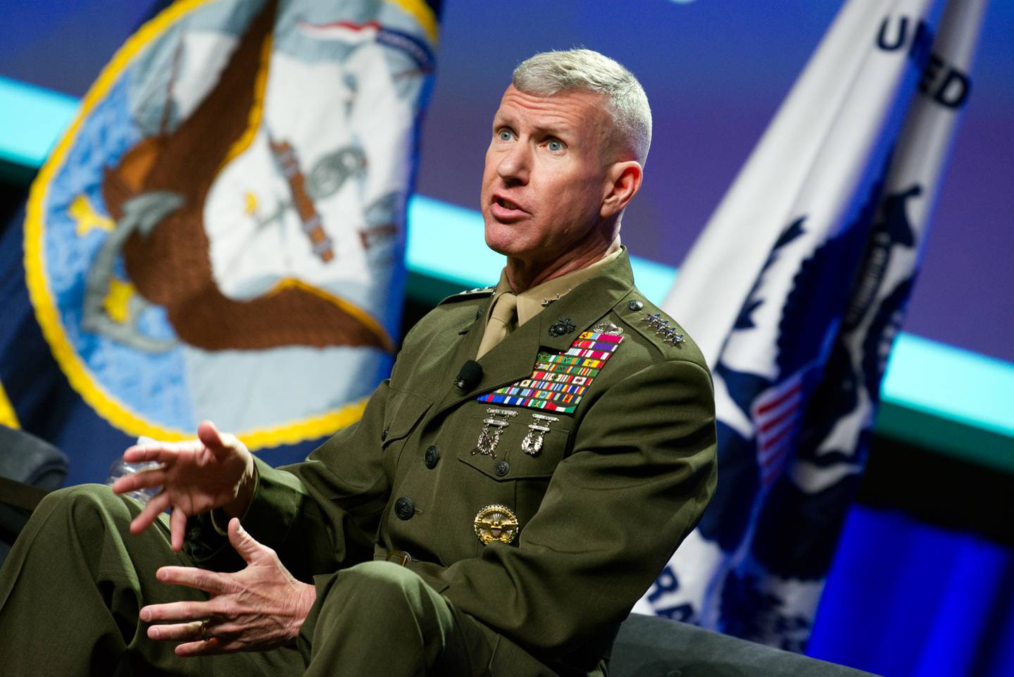 Assistant Commandant Of The Marine Corps Gen. Eric Smith gestures as he speaks onstage at the Sea-Air-Space conference in National Harbor, Maryland, on April 4, 2023.