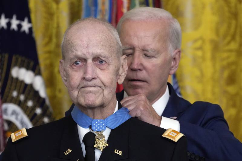President Joe Biden awards the Medal of Honor to Capt. Larry Taylor, an Army pilot from the Vietnam War who risked his life to rescue a reconnaissance team that was about to be overrun by the enemy, during a ceremony Tuesday, Sept. 5, 2023, in the East Room of the White House in Washington.