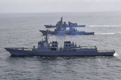 In this photo provided by South Korea Defense Ministry, South Korean Navy's destroyer Yulgok Yi I, bottom, U.S. Navy's the guided missile destroyer USS Benfold and Japan Maritime Self-Defense Force's destroyer Atago, top, sail during a joint missile defense drill among South Korea, the United States and Japan in the international waters of the east coast of Korean peninsular, Monday, April 17, 2023.