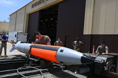 The 72nd Test and Evaluation Squadron test loads an unarmed B61-12 bomb, which can be outfitted with a nuclear warhead, on a B-2 Spirit bomber on June 13, 2022 at Whiteman Air Force Base, Missouri. The 72nd TES conducts testing and evaluation of new equipment, software and weapons systems for the B-2 Spirit Stealth Bomber. (Airman 1st Class Devan Halstead/Air Force)