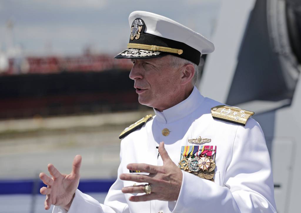 In this  July 27, 2019, file photo, Adm. Craig Faller, commander of U.S. Southern Command, speaks with the news media following a commissioning ceremony for the U.S. Navy's guided missile destroyer Paul Ignatius, at Port Everglades in Fort Lauderdale, Fla.