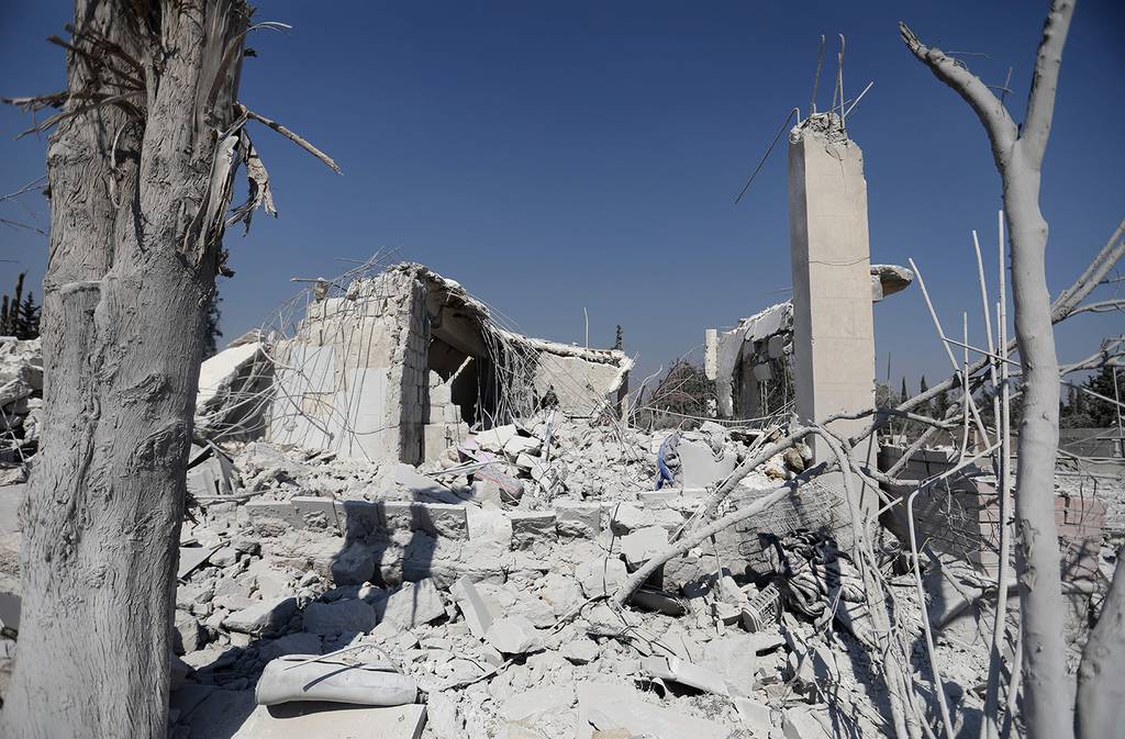The ruins of buildings are pictured July 1, 2019, at the site where the U.S. military carried out a strike against al-Qaida-linked jihadists in Syria's northwestern Aleppo province.