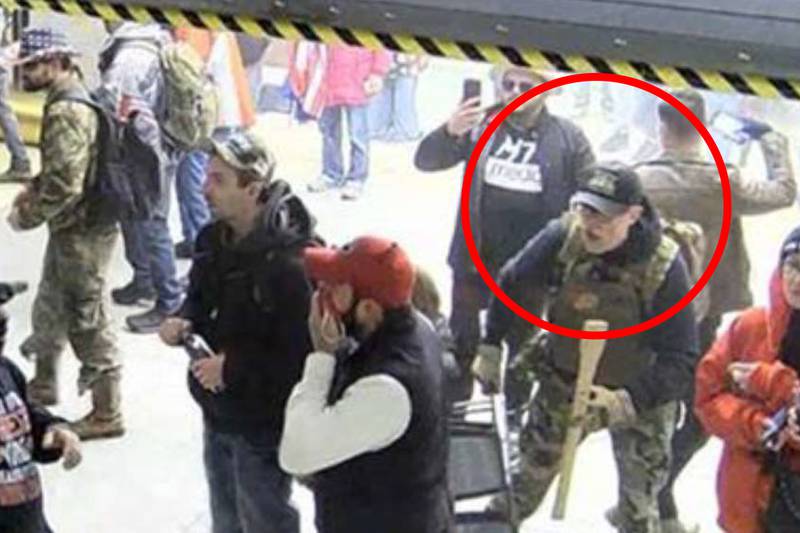 This image from the U.S. Capitol Police security video shows William Chrestman, circled in annotation by the Justice Department in the Motion for Emergency Stay and for Review of Release Order, in a tunnel underneath the U.S. Capitol on Jan 6. 2021, in Washington.