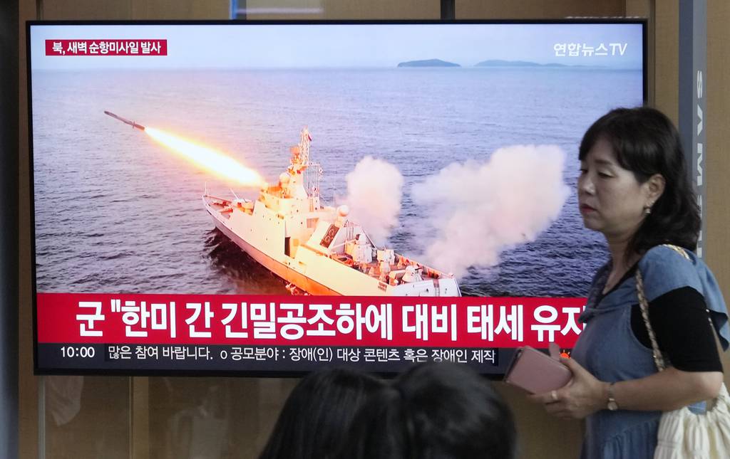 A TV screen shows a file image of North Korea's missile launch during a news program at the Seoul Railway Station in Seoul, South Korea, Saturday, Sept. 2, 2023.