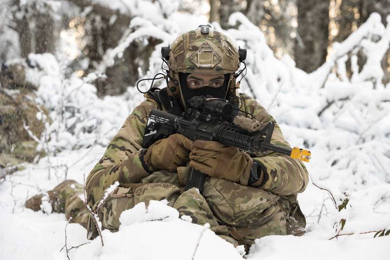 Senior Airman Bryan Guerrero, a tactical air control party apprentice assigned to the 3rd Air Support Operations Squadron, provides security during a patrol halt while conducting small unit training at Joint Base Elmendorf-Richardson, Alaska, Nov. 18, 2020.