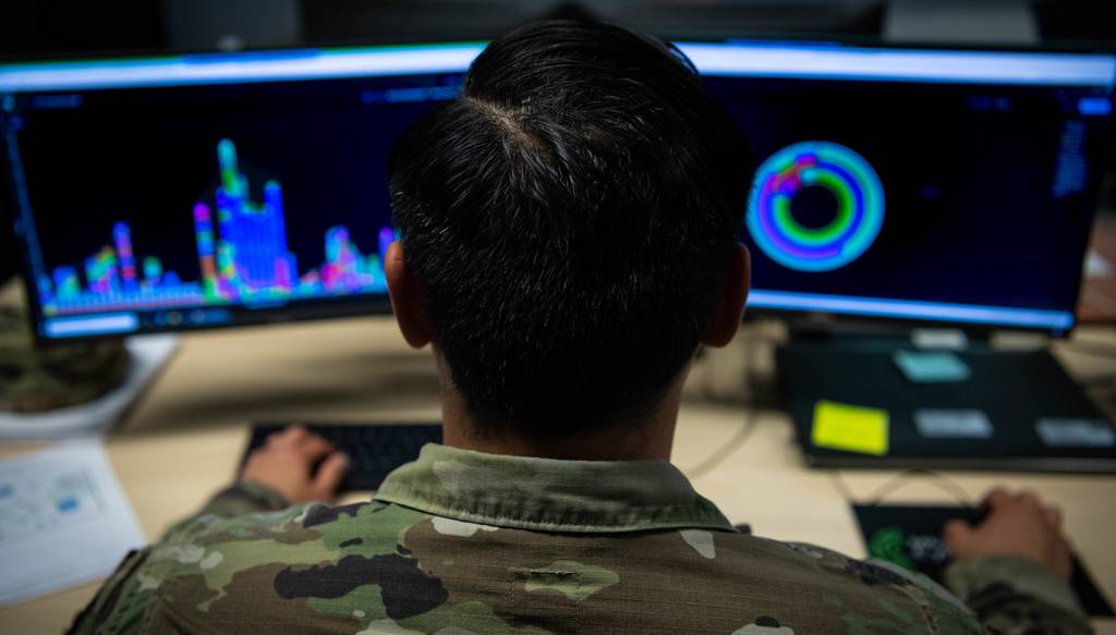 An airman assigned to Spangdahlem Air Base, Germany, performs network analysis during a training exercise at Ramstein Air Base, Germany, May 17, 2022.
