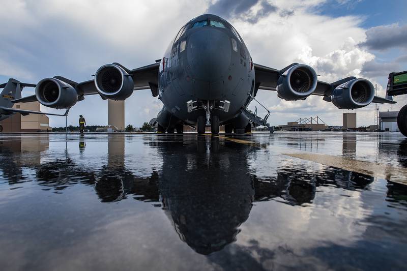 Airman 1st Class Elijah Turner, 911th Aircraft Maintenance Squadron crew chief, performs a walk around inspection on a C-17 Globemaster III at the Pittsburgh International Airport Air Reserve Station, Pa., Aug. 24, 2020