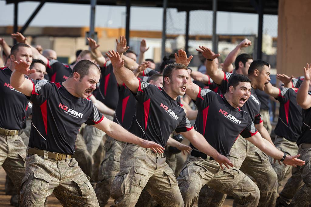 New Zealand Defence Force members perform the NZDF haka during the formal welcoming ceremony, a powhiri, to celebrate Waitangi Day 2019 at Camp Taji, Iraq,