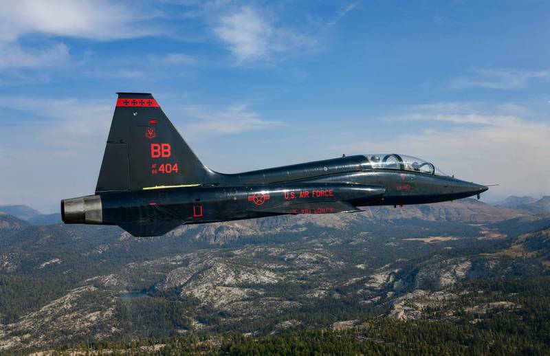 A T-38 Talon with the 1st Reconnaissance Squadron, Beale Air Force Base, California, performs a training mission over mountains in Eastern California, Oct. 9, 2020. The T-38A Talon is a twin-engine, supersonic jet trainer that is used for pilots to remain proficient. (Airman 1st Class Dakota C. LeGrand/Air Force)