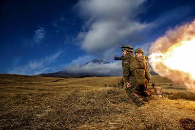 Marines fire a MK-153 shoulder-launched multipurpose assault weapon in a live-fire squad attack range during exercise Fuji Viper 21.1 at Combined Arms Training Center, Camp Fuji, Japan, on Dec. 10, 2020.
