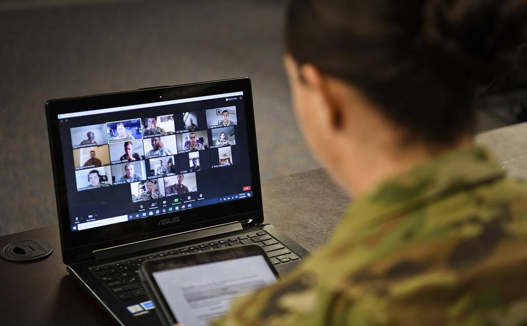 Tech. Sgt. Brianna Walberg, 436th Force Support Squadron Airman Leadership School instructor, discusses online with students from ALS Class 20E May 29, 2020, at Dover Air Force Base, Del.