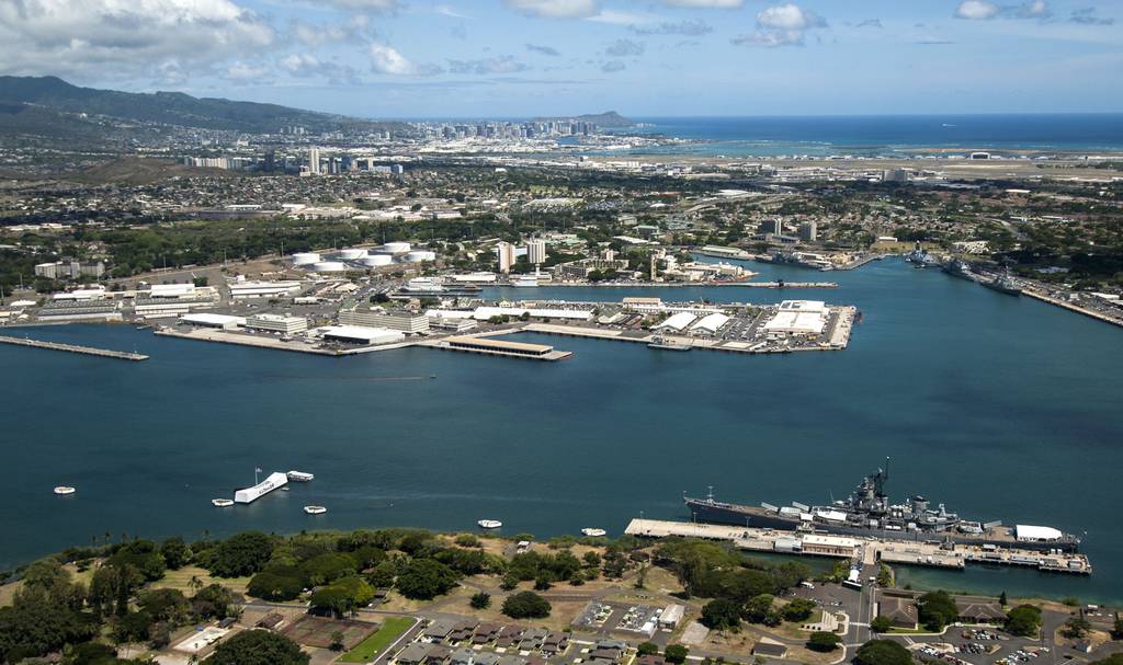 An aerial view of the USS Arizona and USS Missouri Memorials at Ford Island, Joint Base Pearl Harbor-Hickam on Aug. 6, 2013.