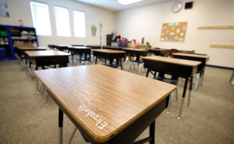 A student's name is written on a desk as a teacher sets up her classroom as teachers begin to prepare to restart school on August 13, 2020 in Provo, Utah.