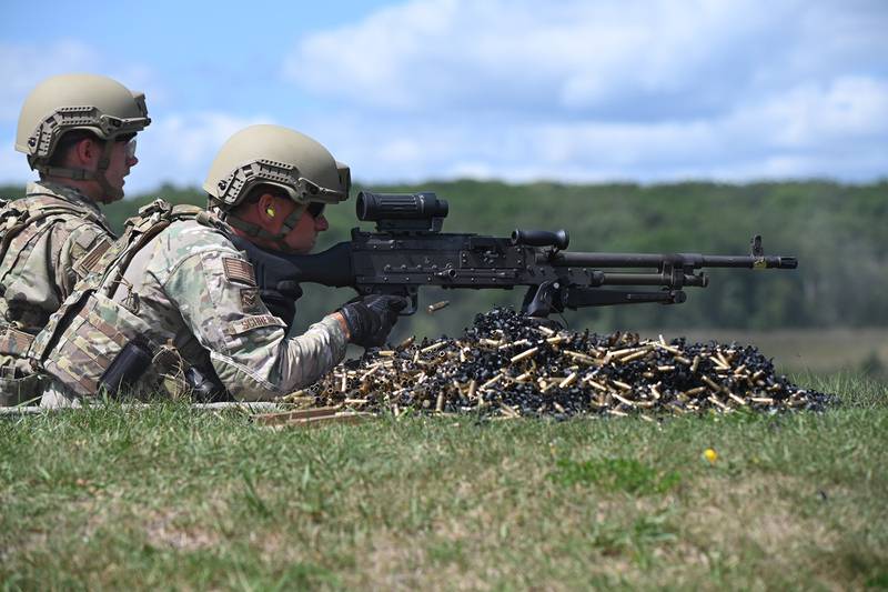 Senior Airman Brian Schreiner, 119th Security Forces Squadron, fires an M240 machine gun at firing-range targets at Camp Ripley Training Center, Minn., Aug. 3, 2020.