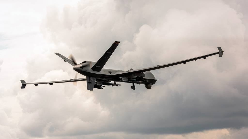 An MQ-9 Reaper assigned to the Arizona Air National Guard flies over Alpena, Mich., July 24, 2019, during a training sortie during exercise Northern Strike 19 at the Alpena Combat Readiness Training Center.