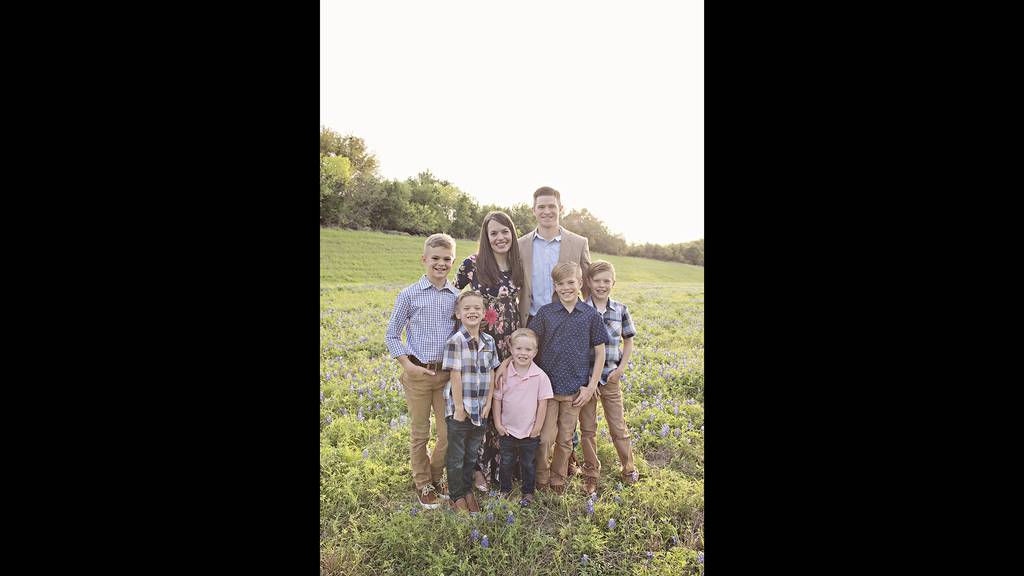Air Force Maj. Matthew Checketts and his wife Jessica with their five children. The couple asked lawmakers to change law to allow service members to use their pre-approved parental leave after the death of a baby.
