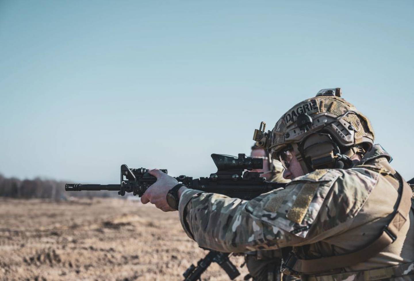 A U.S. Air Force deployed aircraft ground response element airman assigned to the 352nd Special Operations Wing fires a M4 rifle during readiness training in Poland, March 2, 2022. United States Special Operations Command Europe is prepared and strategically positioned to rapidly provide support to NATO Allies and partners and defend against any aggression to maintain stability and security in Europe. (Staff Sgt. Izabella Workman/Air Force)