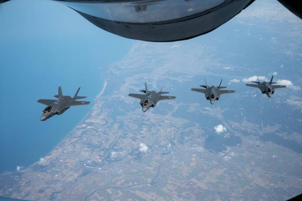 Four F-35A Lightning IIs assigned to the 355th Fighter Squadron, Eielson Air Force Base, Alaska, fly in formation during a routine training mission over the Indo-Pacific, March 10, 2022.