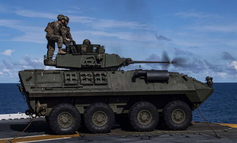 Marines fire a Light Armored Vehicle (LAV) M242 Bushmaster 25mm chain gun during a drill aboard the amphibious assault ship USS Wasp (LHD 1) Aug. 7, 2019, in the Pacific Ocean.