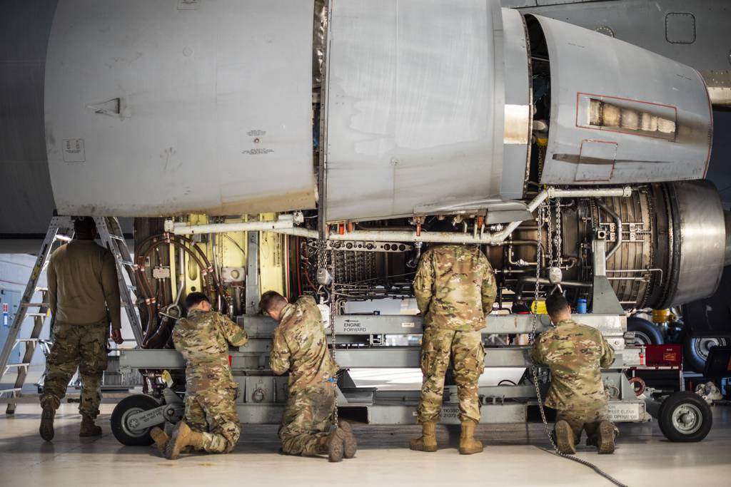 Airmen assigned to the 660th Aircraft Maintenance Squadron swap an engine on a KC-10 Extender at Travis Air Force Base, Calif., Oct. 25, 2022. The 660th AMXS maintains, repairs and advances Travis AFB’s fleet of KC-10s. (Nicholas Pilch/Air Force)