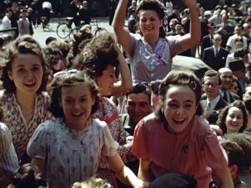 French women cheer U.S. soldiers after the liberation of Paris in 1944