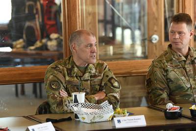 U.S. Air Force Lt. Gen. Thomas Bussiere (left), the deputy commander
of U.S. Strategic Command, has lunch with members of the 90th Operations Support Squadron at F.E. Warren Air Force Base, Wyo., March 31, 2021. Bussiere was nominated in October 2022 to run Air Force Global Strike Command. (Airman 1st Class Darius Frazier/Air Force)