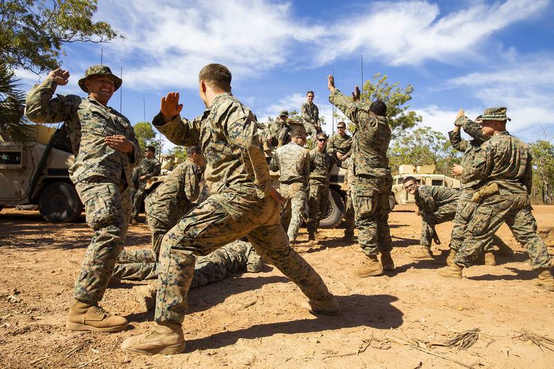 U.S. Marine Corps Lance Cpls. Jarom Hofmann and Jonathan Steed take a break from training at Kangaroo Flats Training Area, Northern Territory, Australia, July 27, 2020.