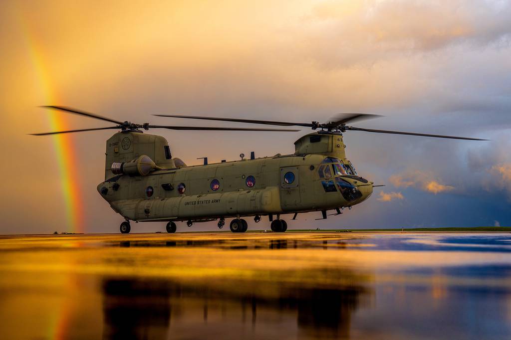 A CH-47 Chinook spins up for an evening training flight just after a storm clears on Oct. 6, 2020, at Katterbach Army Airfield in Germany.