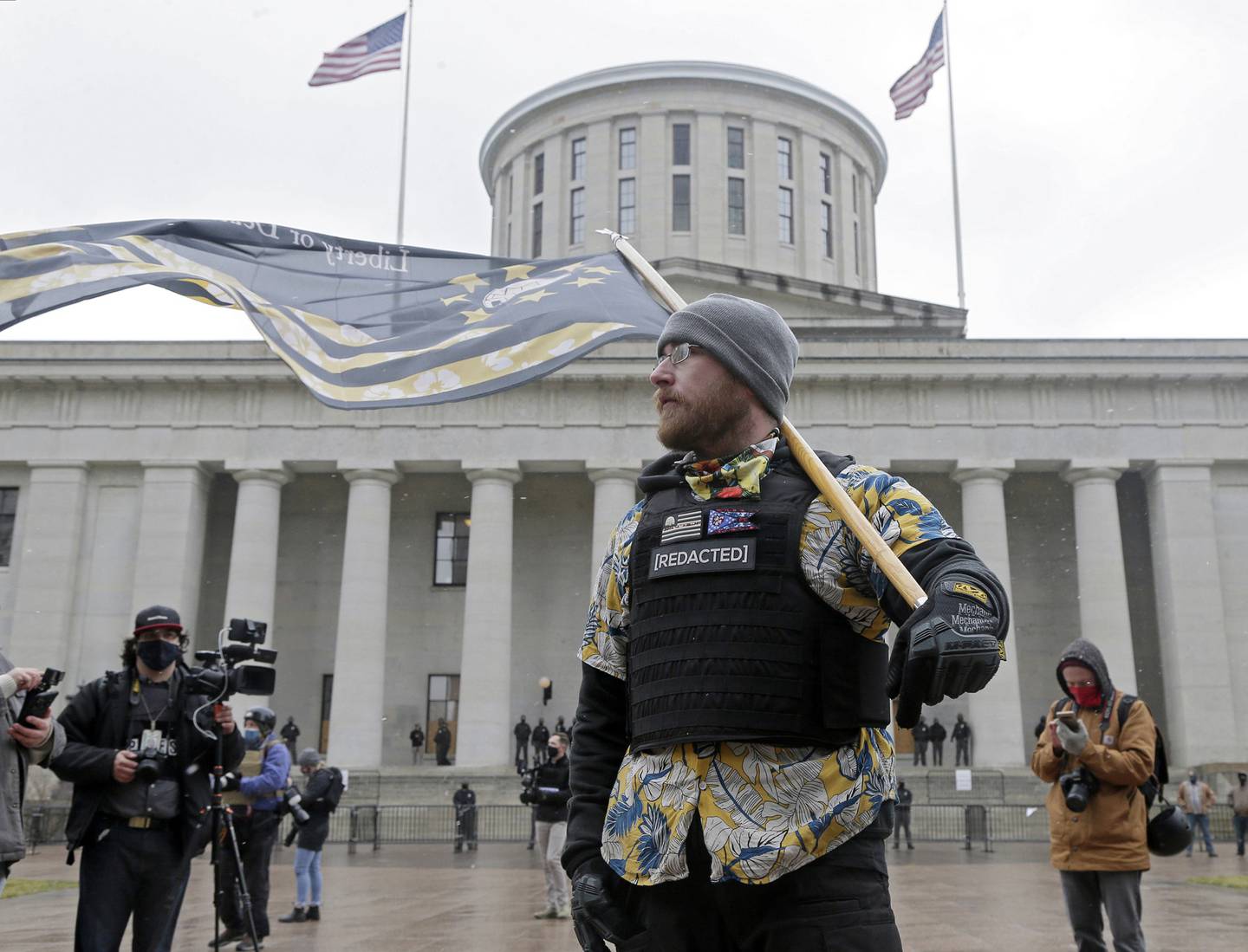 Members of the Boogaloo Boys attend protest Sunday at the Ohio Statehouse in downtown Columbus, Ohio, Sunday, Jan. 17, 2021.