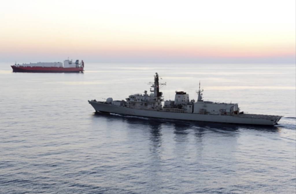 British navy vessel HMS Montrose escorts another ship during a mission to remove chemical weapons from Syria at sea off coast of Cyprus in February 2014.