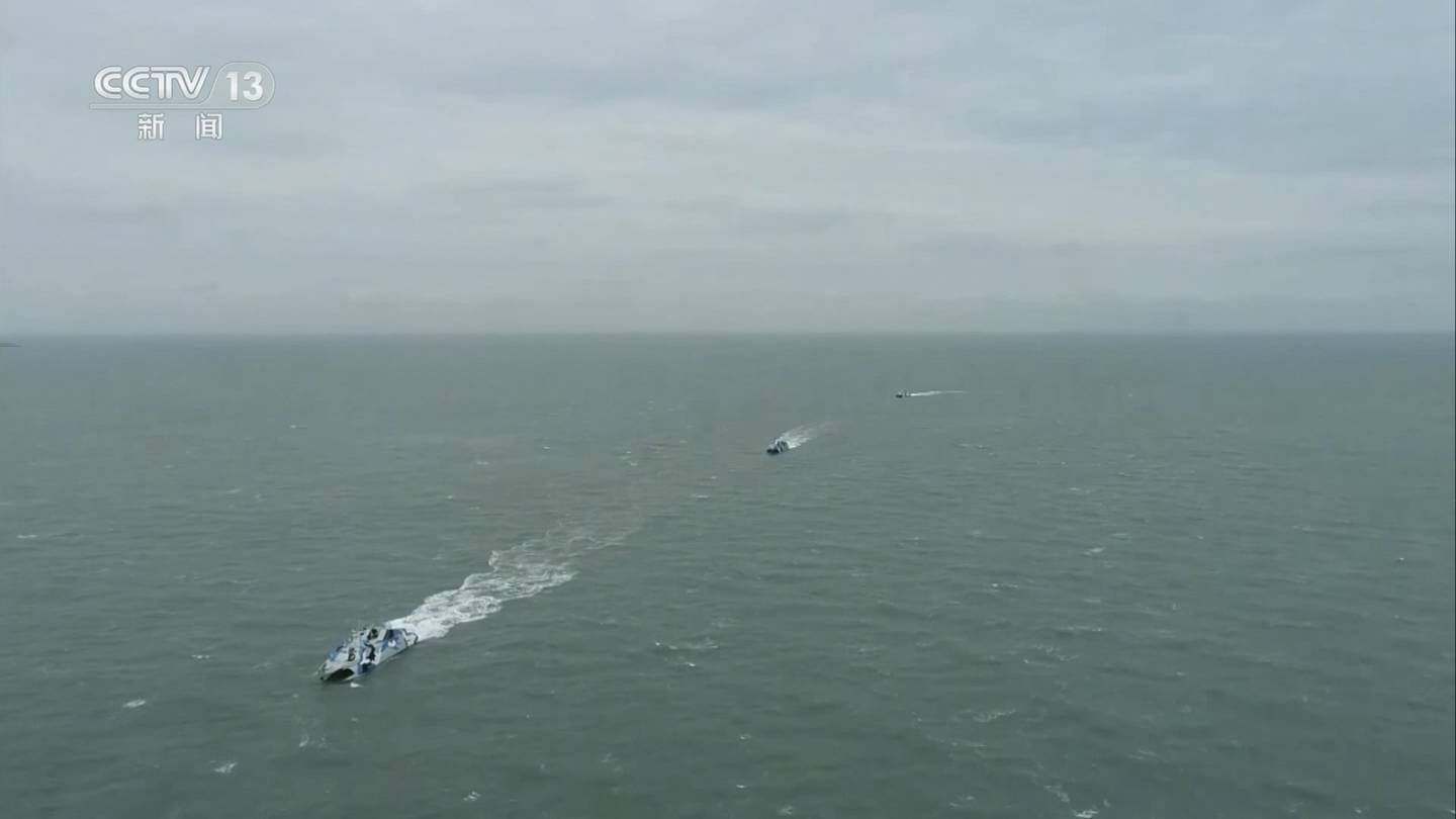 In this image taken from video footage run Saturday, April 8, 2023 by China's CCTV, a Chinese ships sail in the Taiwan Strait.