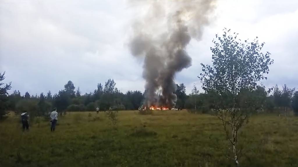 In this image taken from video, smoke and flames rise from a crashed private jet near the village of Kuzhenkino, Tver region, Russia, Wednesday, Aug. 23, 2023.
