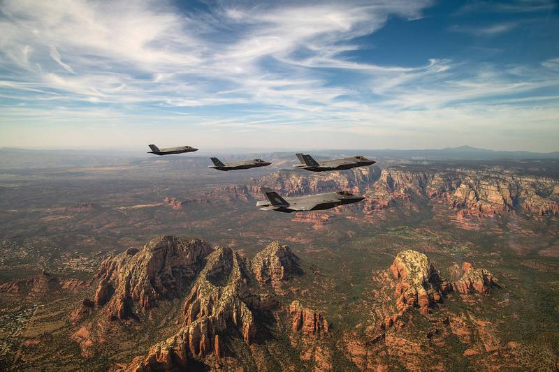 Two U.S. Air Force and two Royal Australian Air Force F-35A Lightning II’s fly in formation during a commemoration flight Oct. 8, 2020, over Sedona, Ariz.