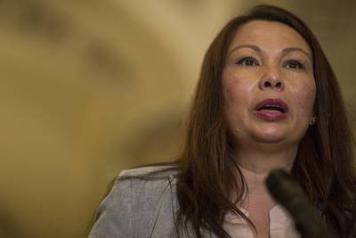 Sen. Tammy Duckworth, D-Ill., speaks during a weekly news conference on Capitol Hill  on Aug. 21, 2018, in Washington.