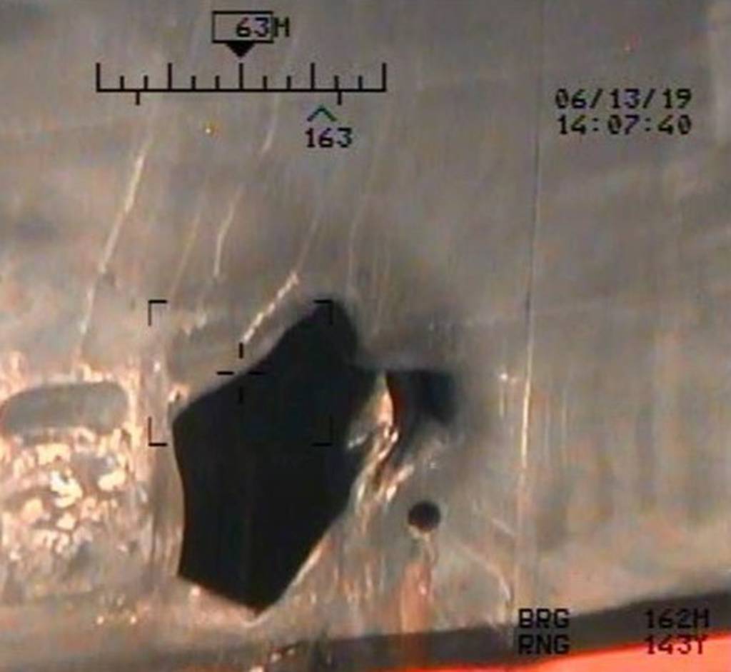 Imagery taken from a U.S. Navy MH-60R helicopter of the Islamic Revolutionary Guard Corps Navy after removing an unexploded limpet mine from the M/T Kokuka Courageous (CENTCOM)