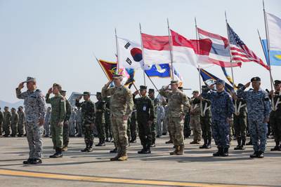 Service members from participating nations attend the opening ceremony of Exercise Cobra Gold at Utapao International Airport, Ban Chang district, Rayong province, Kingdom of Thailand, Feb. 28, 2023.
