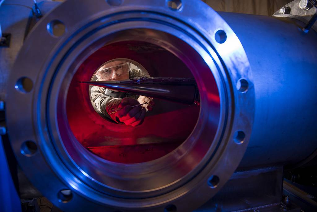 In this Jan. 31, 2019, image provided by the U.S. Air Force Academy, Cadet 2nd Class Eric Hembling uses a Ludwieg Tube to measure the pressures, temperatures, and flow field of various basic geometric and hypersonic research vehicles at Mach 6 in the United States Air Force Academy's Department of Aeronautics, in Colorado Springs, Colo.
