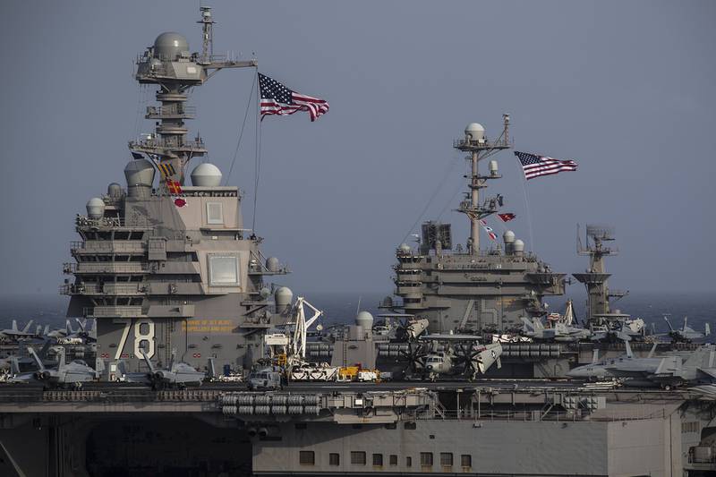 The Ford-class aircraft carrier USS Gerald R. Ford (CVN 78) and the Nimitz-class aircraft carrier USS Harry S. Truman (CVN 75) transit the Atlantic Ocean June 4, 2020, marking the first time a Ford-class and a Nimitz-class aircraft carrier have operated together underway.
