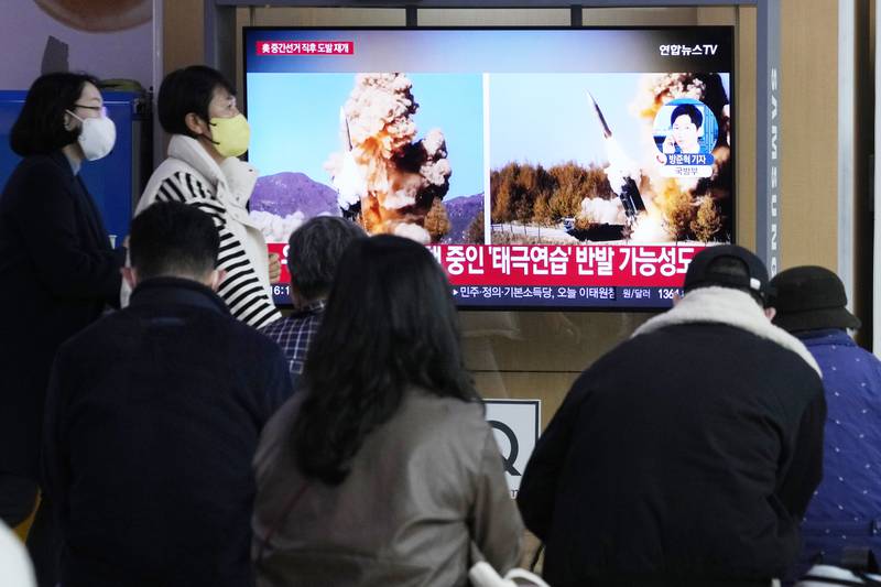 A TV screen shows file images of North Korea's missile launch during a news program at the Seoul Railway Station in Seoul, South Korea, Wednesday, Nov. 9, 2022.
