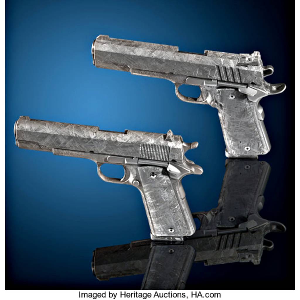 This rare set of 1911 pistols made from Muonionalusta Meteorite is up for auction at Heritage Auctions. Both pistols were made by noted gunsmith Lou Biondo of Business End Customs, and each gun has test fired 35 rounds.