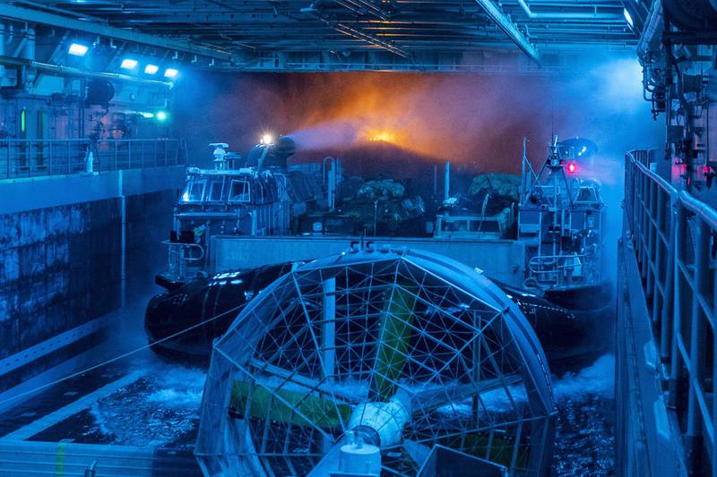 A landing craft, air cushion enters the well deck of the San Antonio-class amphibious transport dock ship USS John P. Murtha (LPD 26) on May 28, 2019, in the Pacific Ocean.