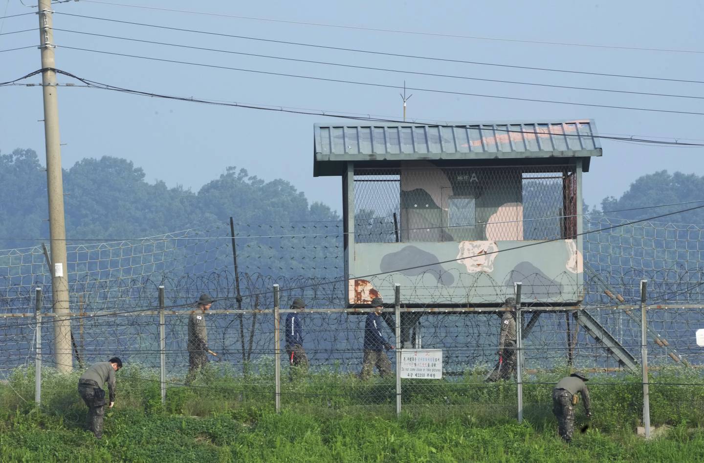 South Korean army soldiers work in font of a military guard post at the Imjingak Pavilion in in Paju, South Korea, near the border with North Korea, Friday, July 21, 2023.