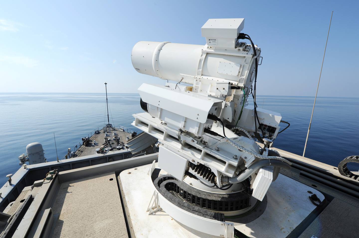 The Afloat Forward Staging Base (Interim) USS Ponce conducts a demonstration of the Office of Naval Research-sponsored Laser Weapon System while deployed to the Arabian Gulf.