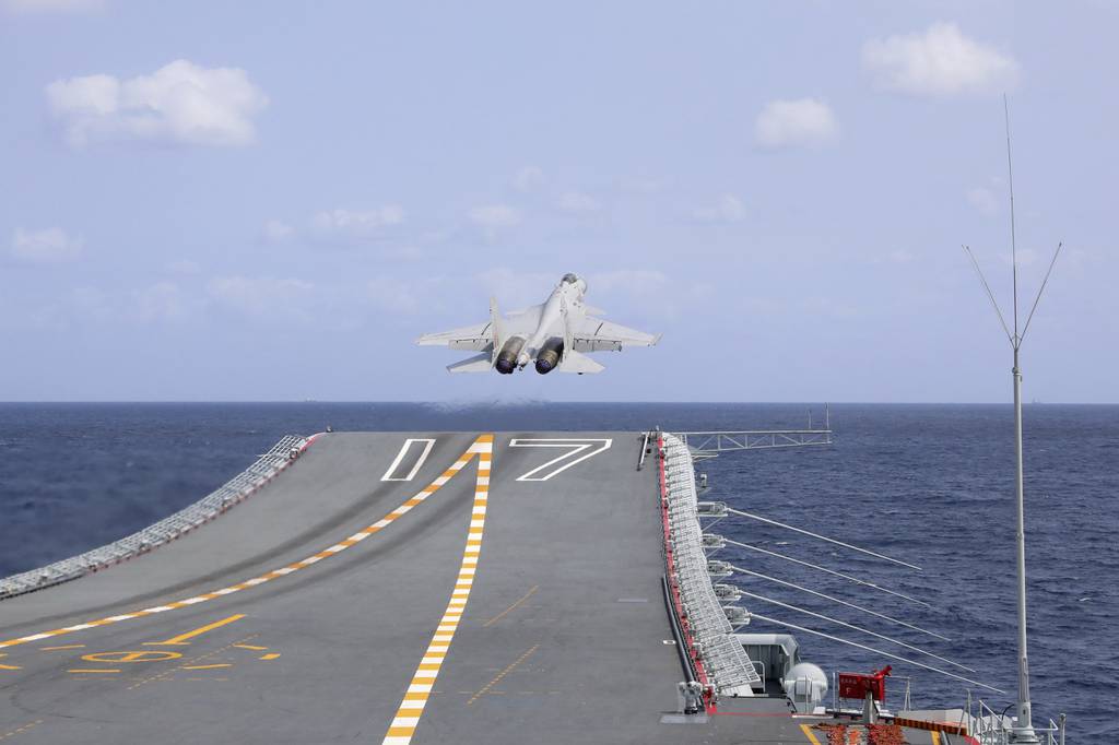 In this photo released by Xinhua News Agency, a J-15 Chinese fighter jet takes off from the Shandong aircraft carrier during the combat readiness patrol and military exercises around the Taiwan Island by the Eastern Theater Command of the Chinese People's Liberation Army on, April 9, 2023.