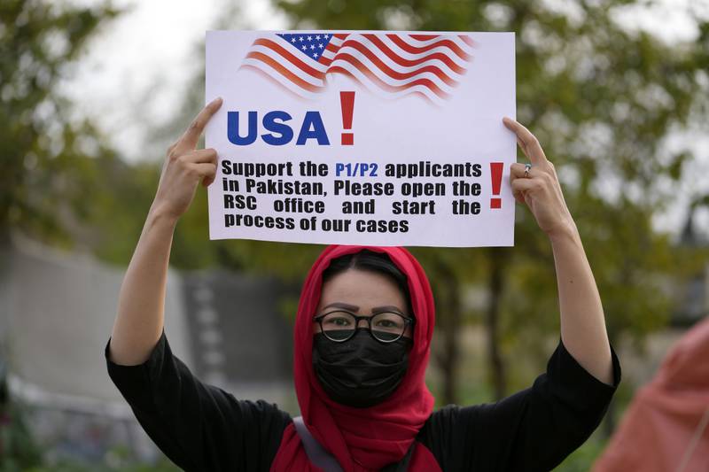 An Afghan refugee attends a rally demanding their U.S. visas to be processed in Islamabad, Pakistan, Sunday, Feb. 26, 2023.