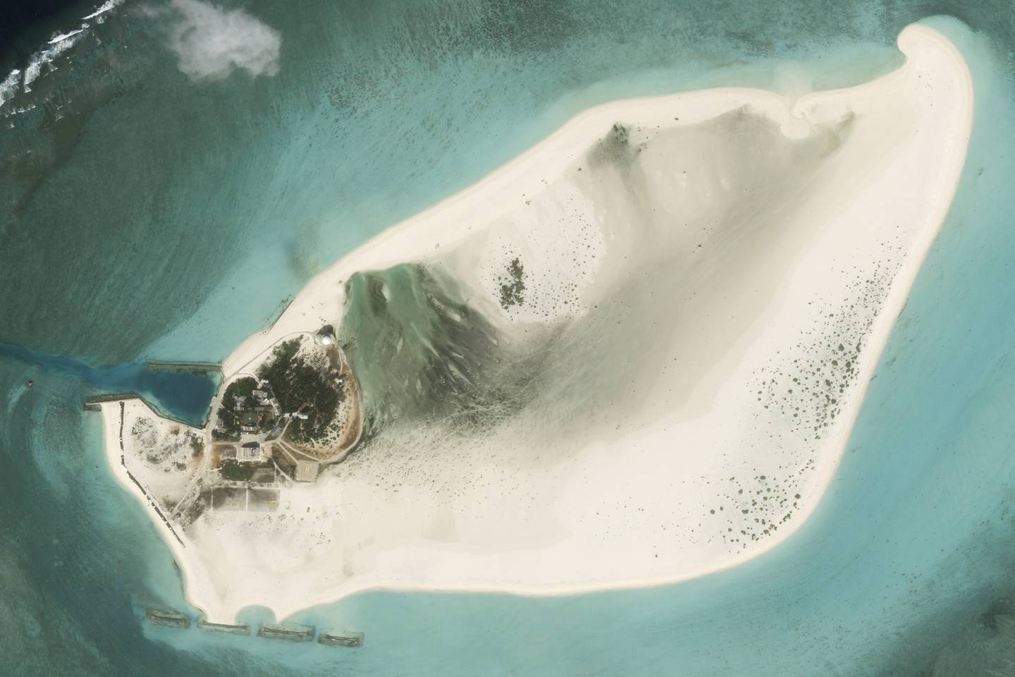 This satellite photo from Planet Labs PBC shows Triton Island in the South China Sea on Feb. 20, 2023.