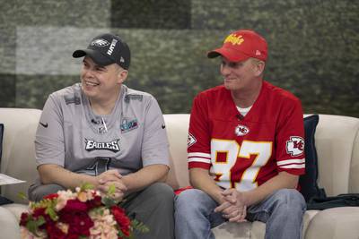 In this image provided by NBC News’ TODAY, Philadelphia Eagles fan Billy Welsh and Kansas City Chiefs fan John Gladwell sit together during a broadcast of the show, Wednesday, Feb. 8, 2023, in New York.