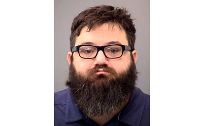 This booking photo provided by the Indianapolis Metropolitan Police Department shows Dustin Passarelli, who was charged in the road rage shooting death of a Muslim man.
