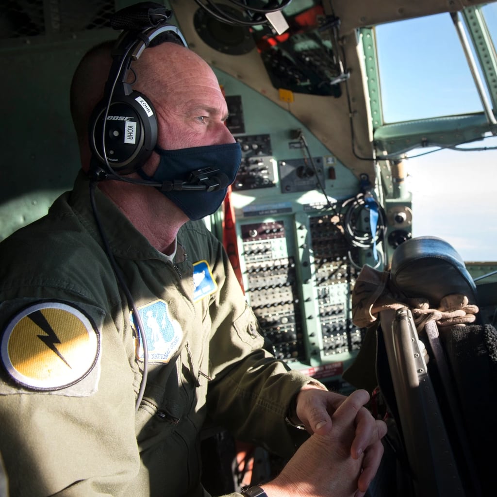Then-Chief Master Sgt. Jamie Kohr, a flight engineer assigned to the 103rd Operations Group, works aboard a C-130H aircraft en route to Washington, D.C., January 15, 2021, East Granby, Connecticut. Guardsmen were mobilized in support of security operations in the days leading up to the United States presidential inauguration. (Tech. Sgt. Tamara R. Dabney/Air National Guard)